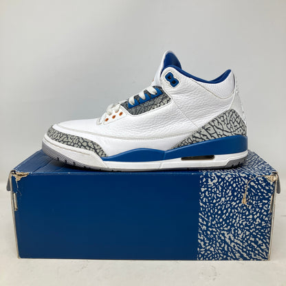 Jordan 3 Retro Wizards white and blue sneaker with elephant print detailing on original box, pre-owned condition