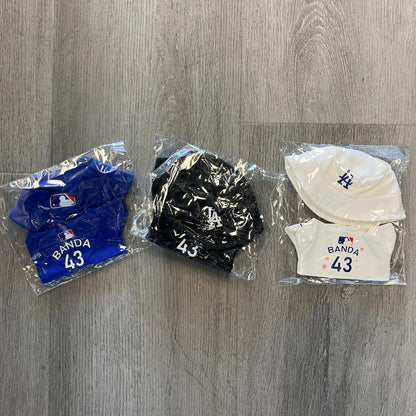 Anthony Banda Dodgers jersey and cap sets in blue, black, and white packaging