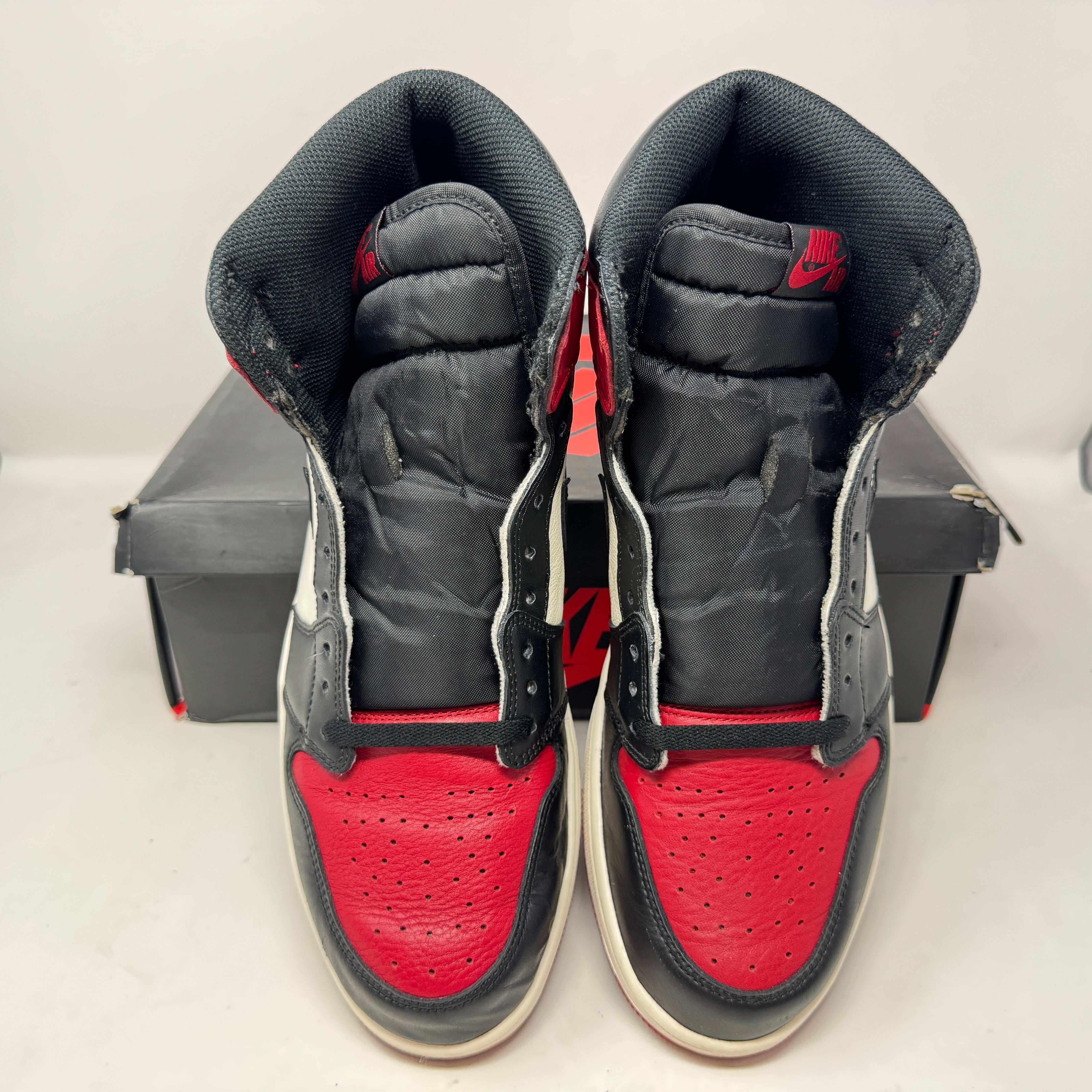 Preowned Jordan 1 Retro High Bred Toe sneakers with box.