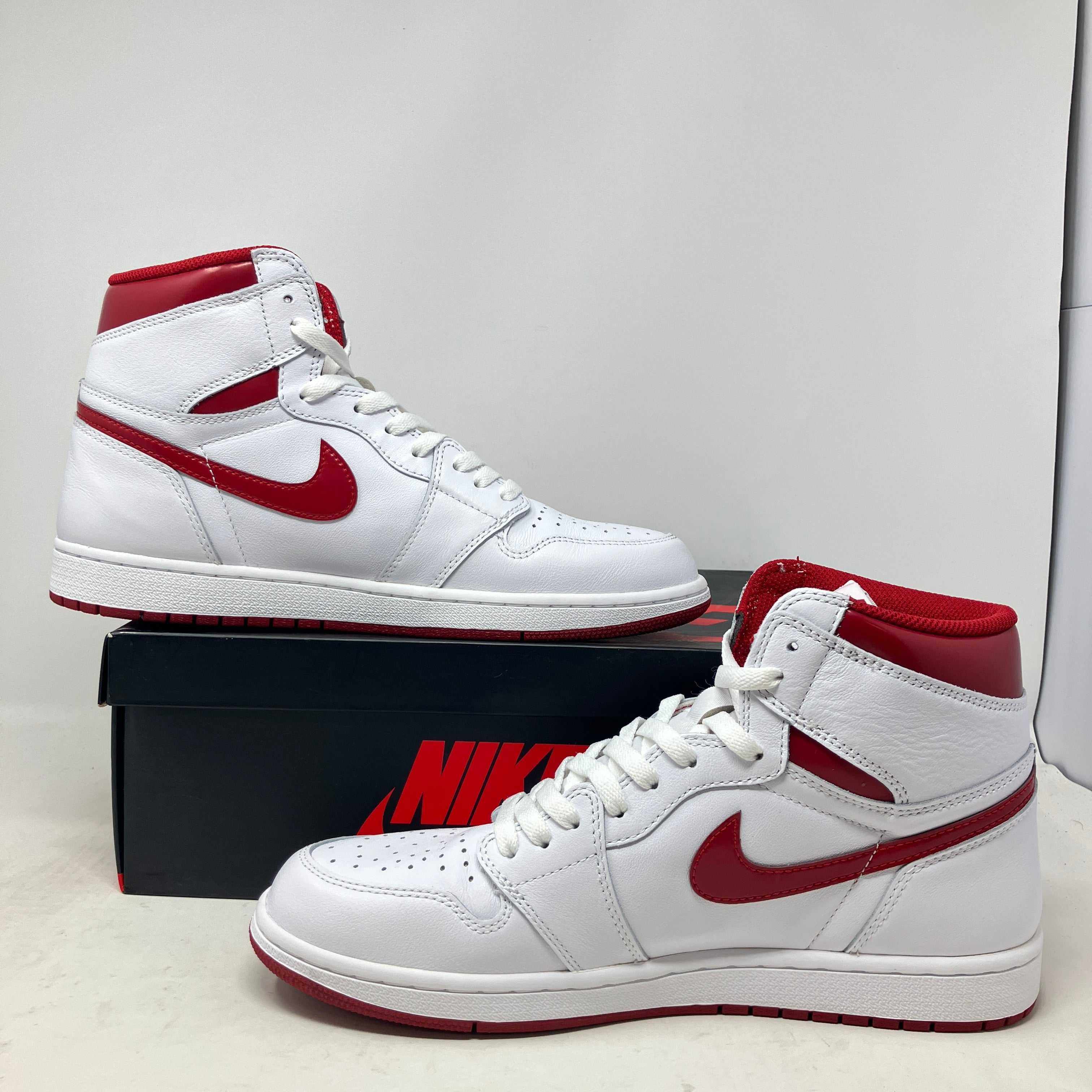 Jordan 1 Retro Metallic Red 2017 sneakers, pre-owned, with box and accessories.