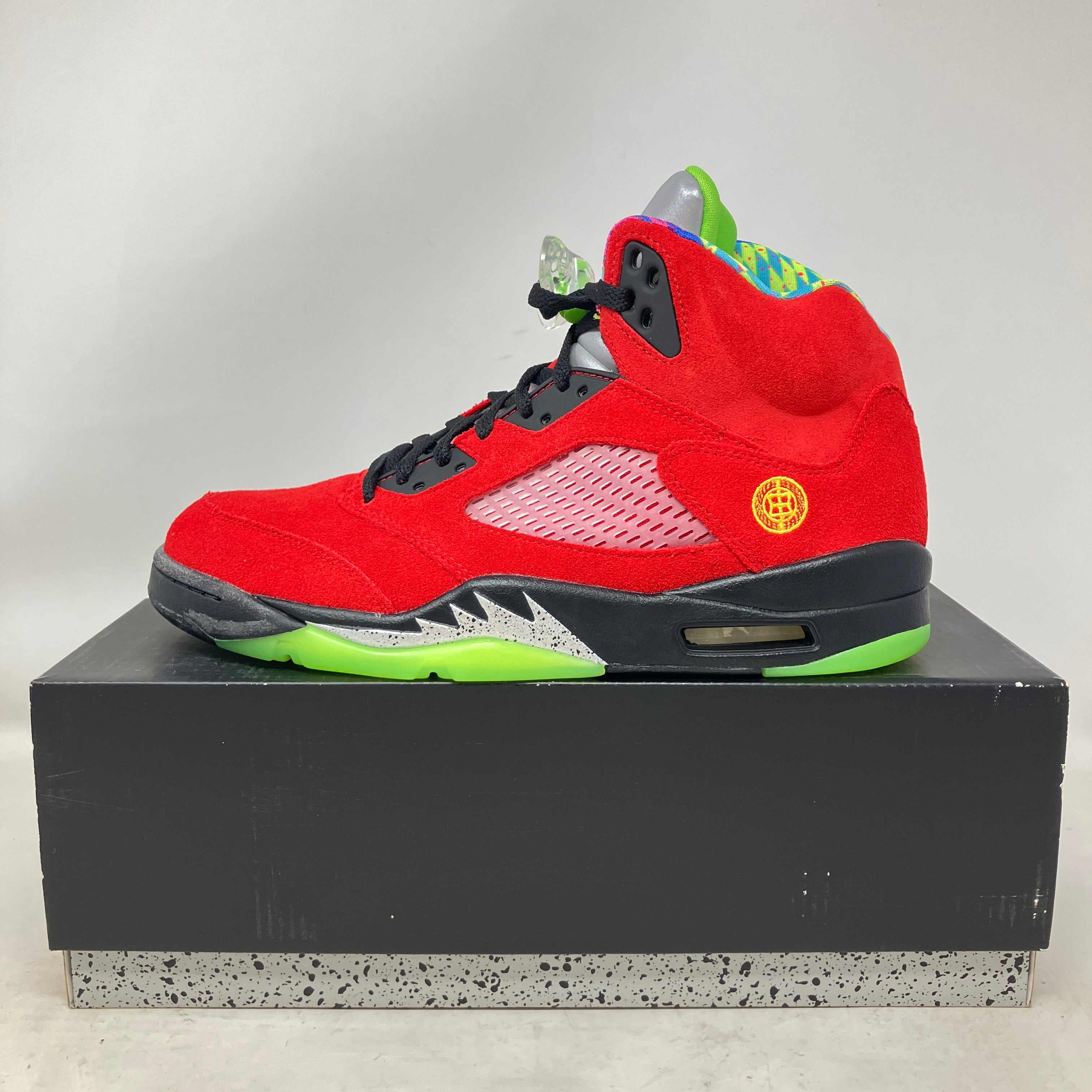 Jordan 5 Retro What The red sneaker with black and green sole on box, brand new with accessories included