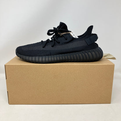 adidas Yeezy Boost 350 V2 Onyx sneaker, brand new with all accessories, displayed on box.
