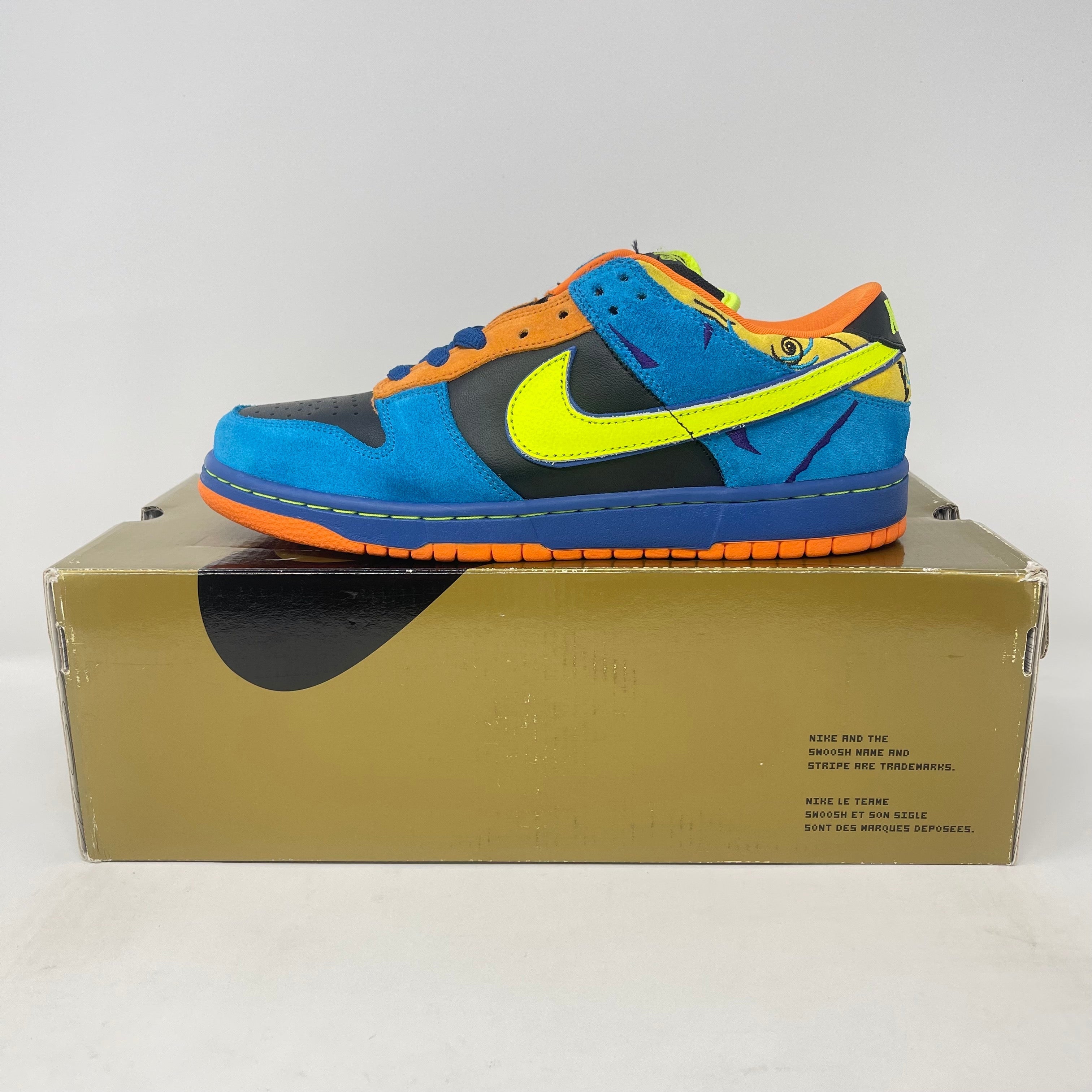 Nike SB Dunk Low Skate or Die sneaker in blue, orange, and neon yellow on gold Nike box, brand new condition