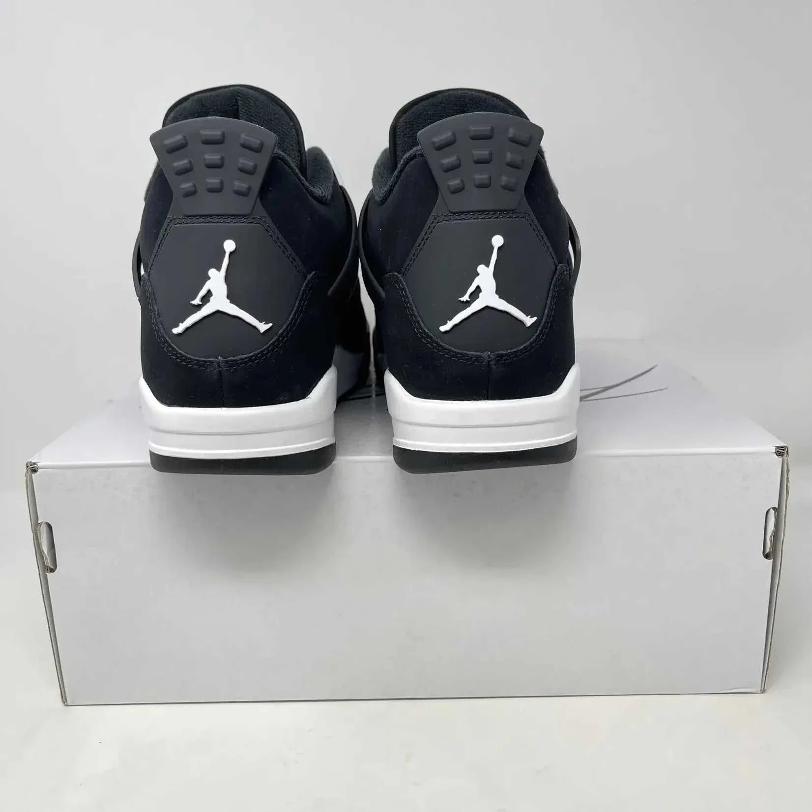 Jordan 4 Retro White Thunder sneakers, brand new condition, complete with accessories.