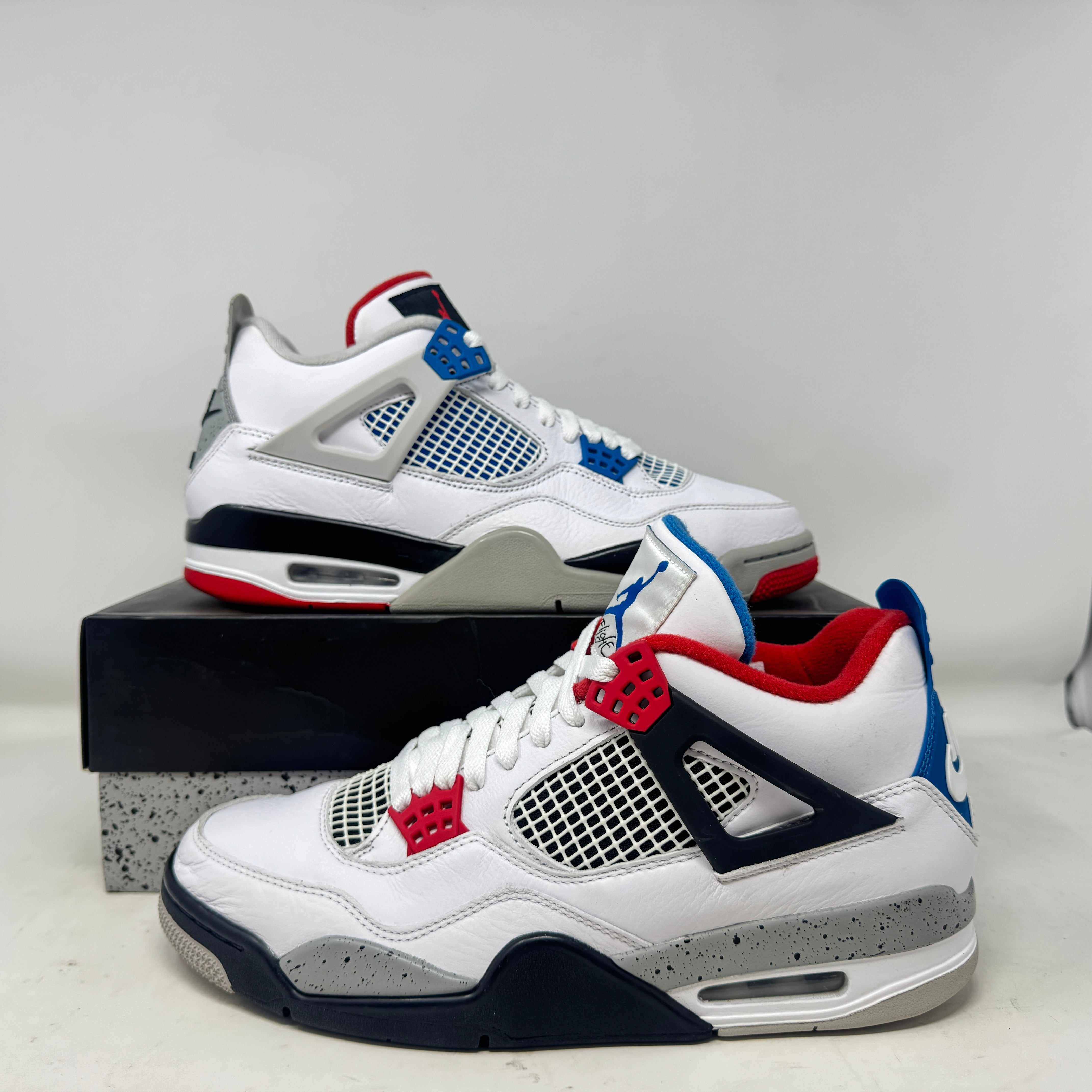 Jordan 4 Retro What The sneakers, pre-owned with all accessories included.