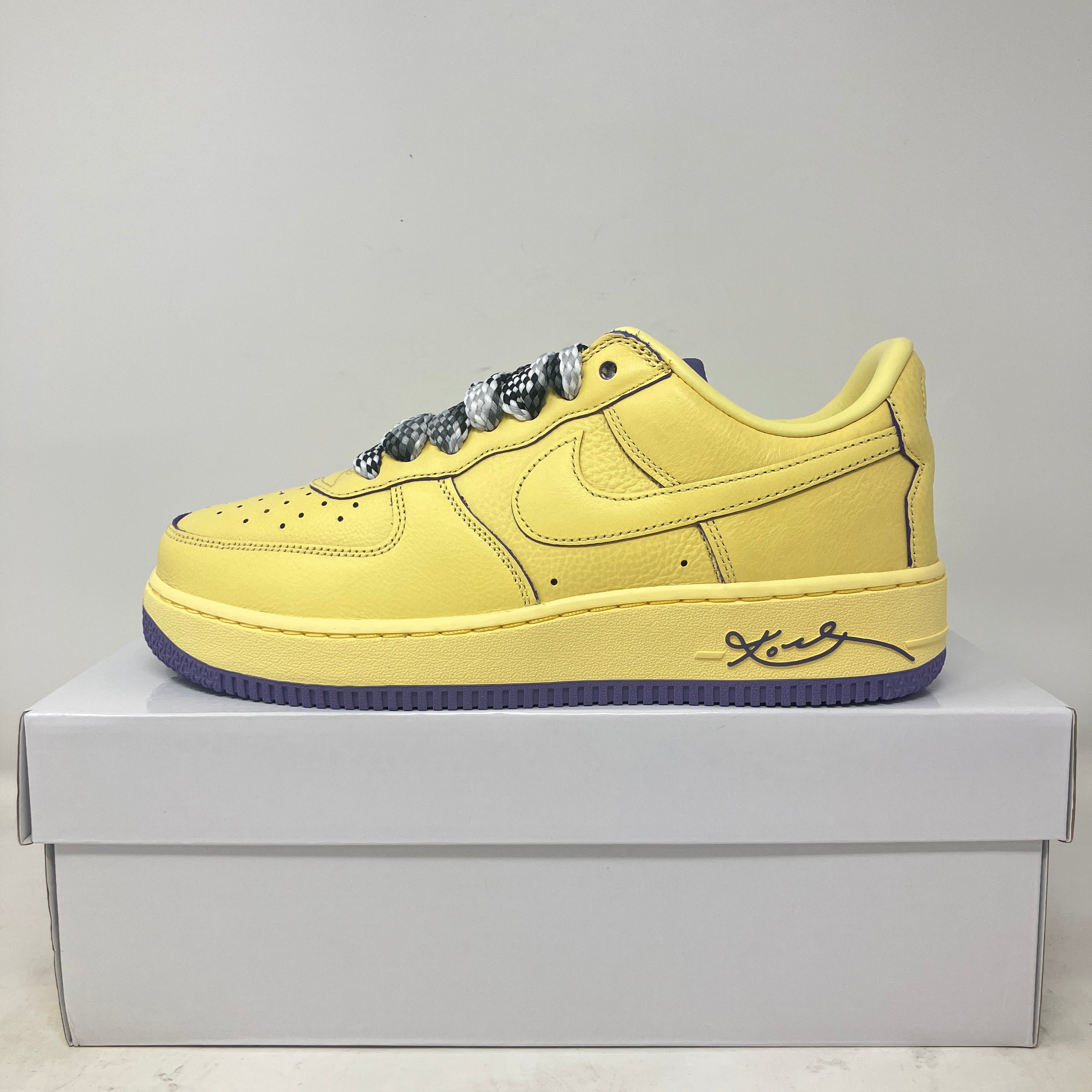 Yellow Nike Air Force 1 Low Protro Kobe Bryant Mamba Mentality sneaker on white box
