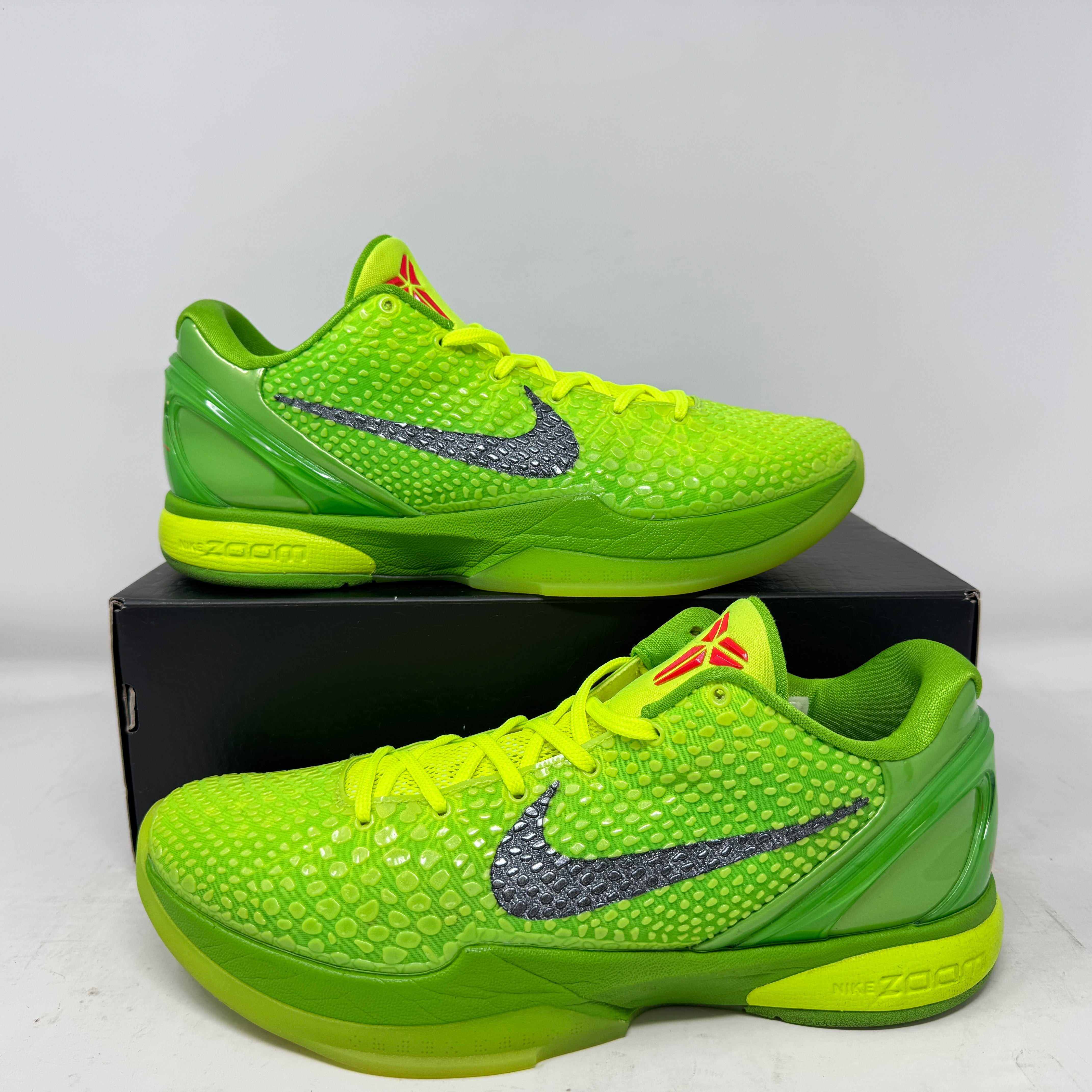 Nike Kobe 6 Protro Grinch 2020 sneakers in green with black swoosh on a rep box.