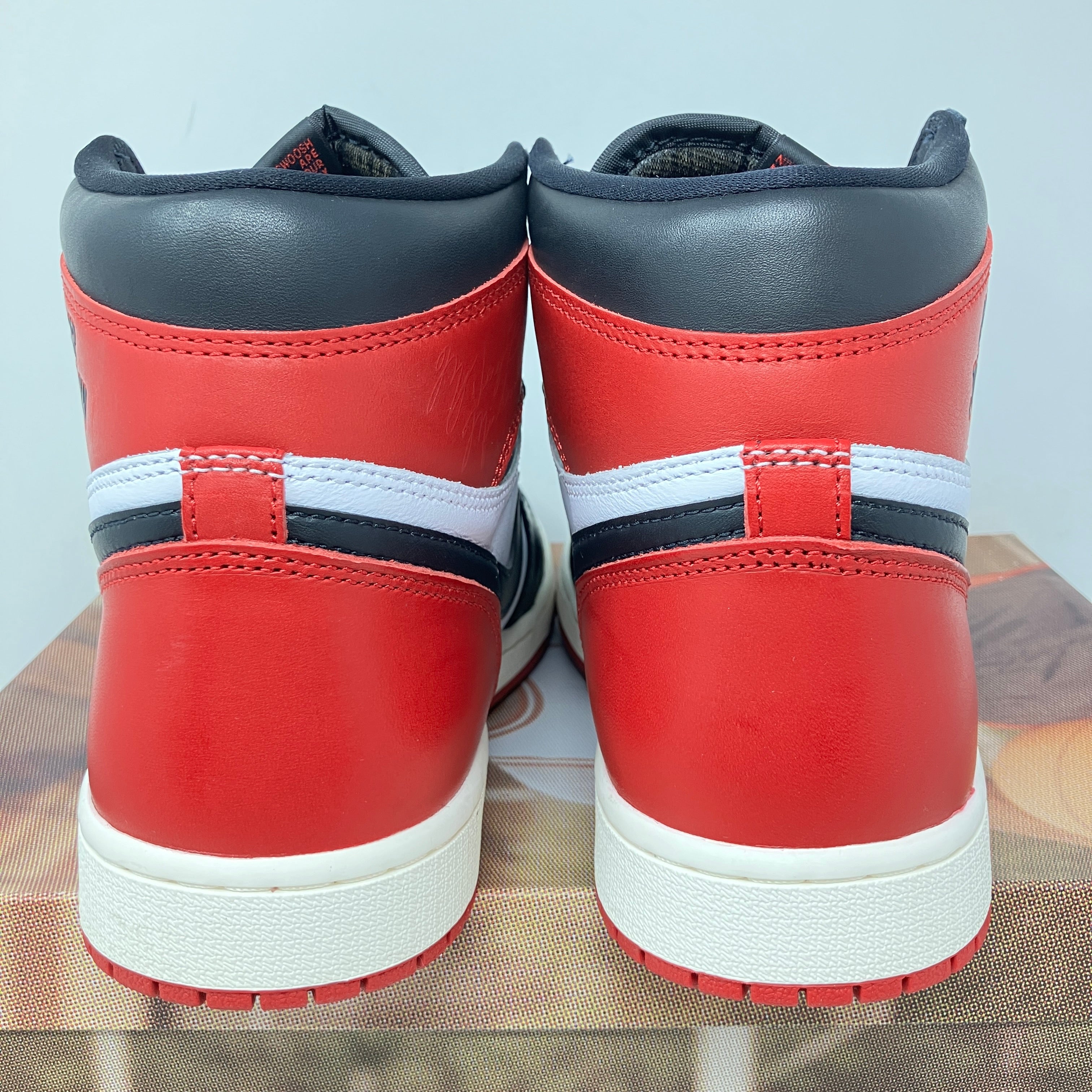 Jordan 1 Retro High OG Black Toe Reimagined