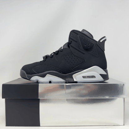 Black Jordan 6 Retro Chrome sneaker on its original pre-owned box with all accessories included