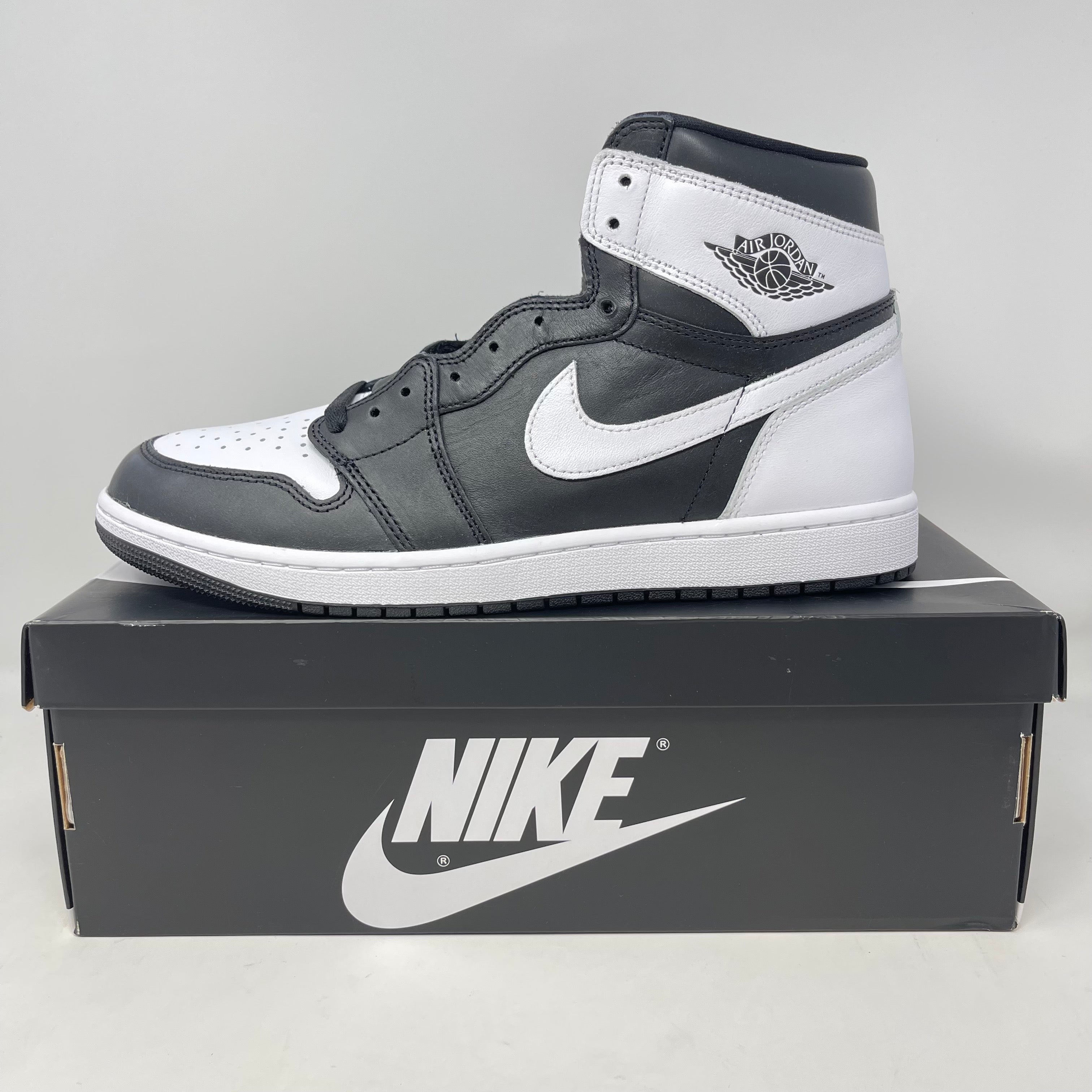 Jordan 1 Retro High OG Black White sneakers on box, brand new condition.
