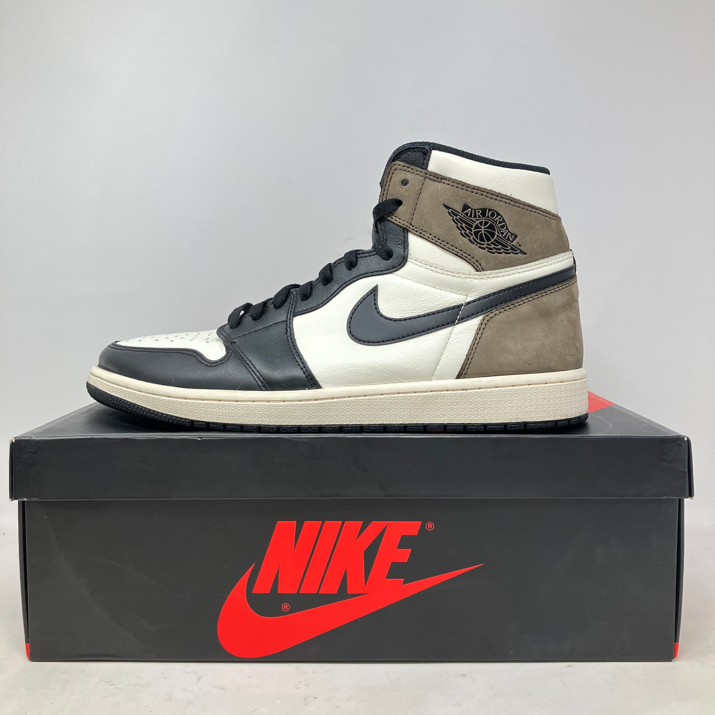 Jordan 1 Retro High Dark Mocha sneaker on Nike box, preowned with accessories included