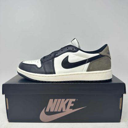 Jordan 1 Retro Low OG Mocha sneaker in black, white, and mocha colors displayed on Nike shoebox, brand new with all accessories included