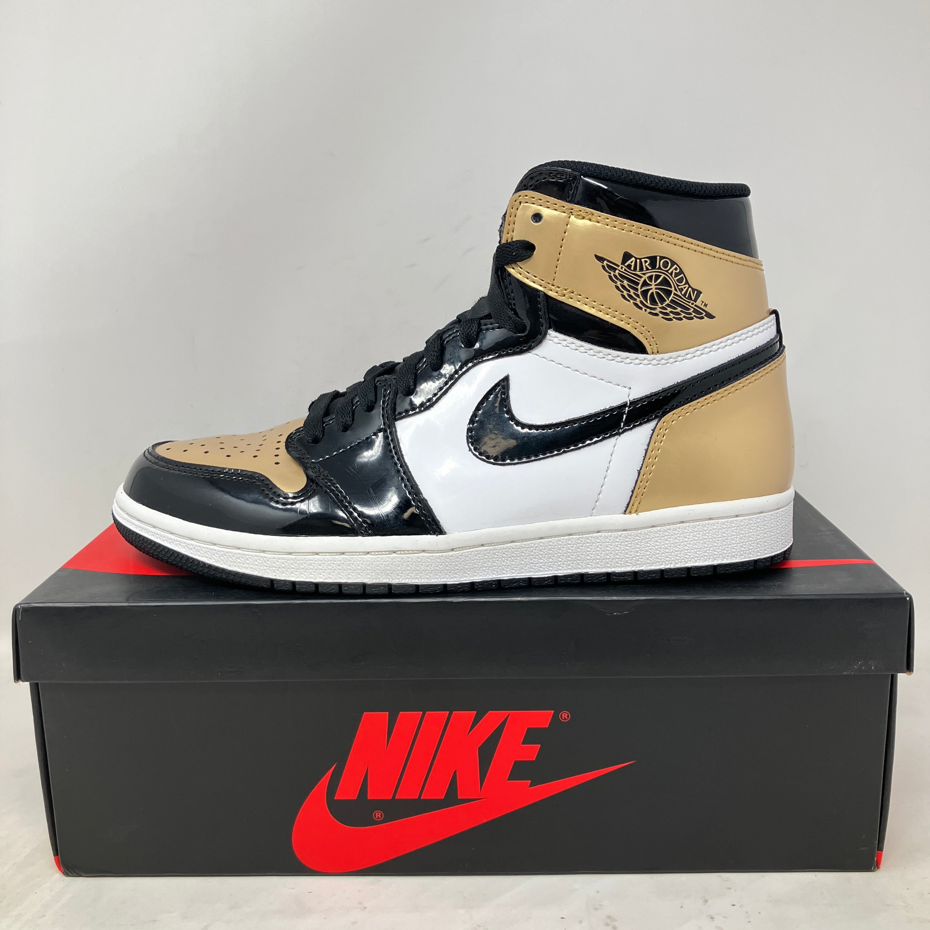 Jordan 1 Retro High NRG Patent Gold Toe