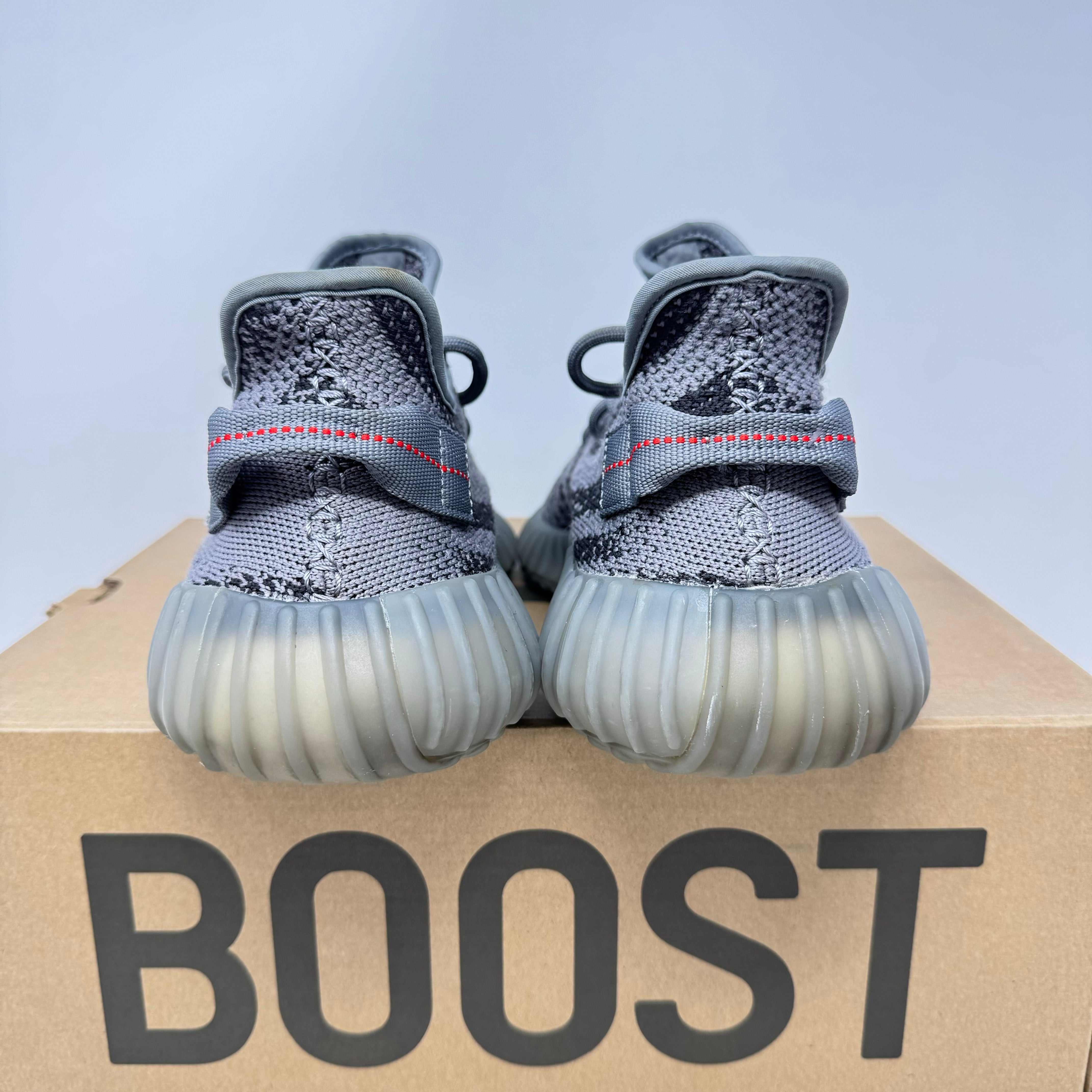 adidas Yeezy Boost 350 V2 Beluga 2.0 sneakers on box, preowned condition with accessories included.