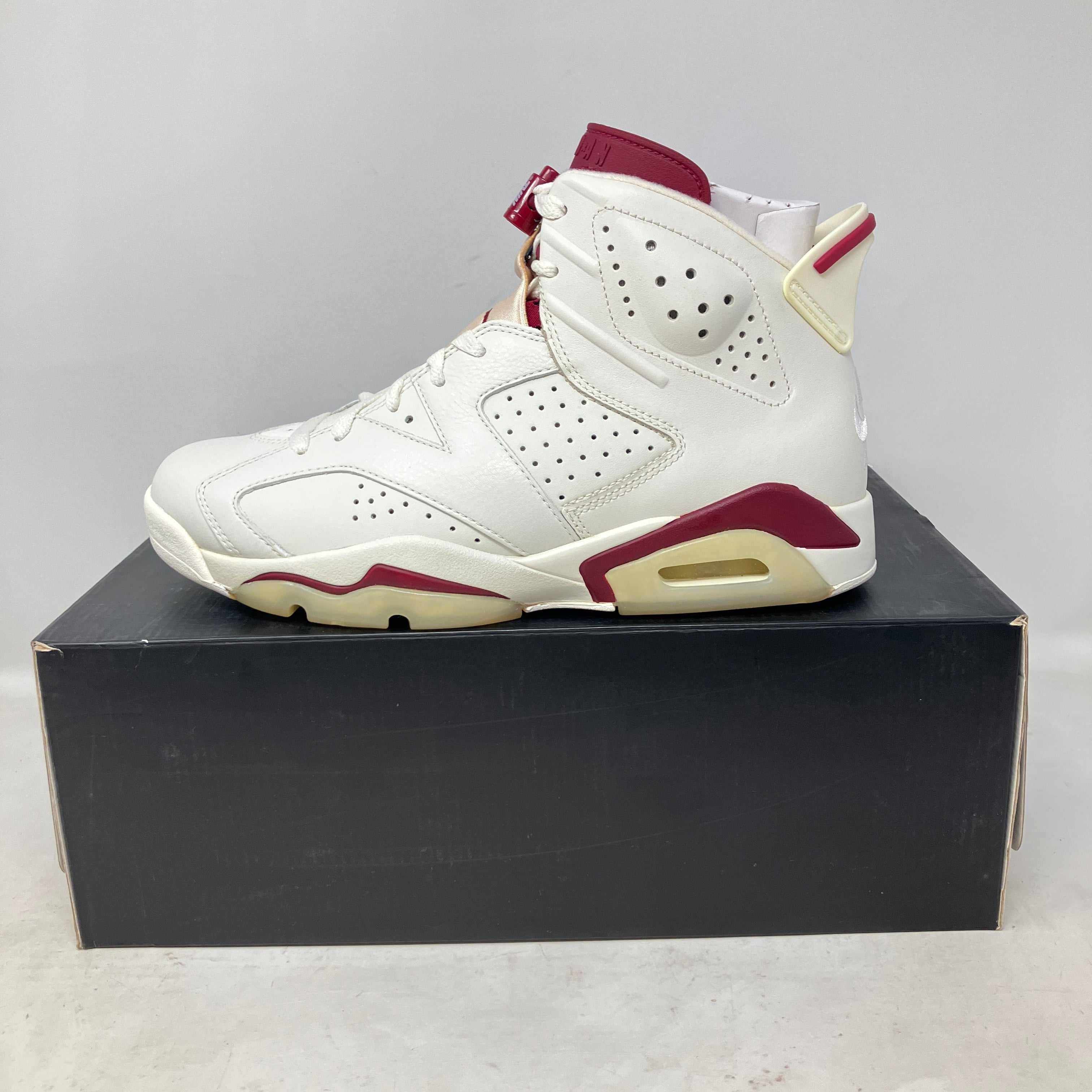 Jordan 6 Retro Maroon 2015 sneaker in brand new condition with accessories on black box
