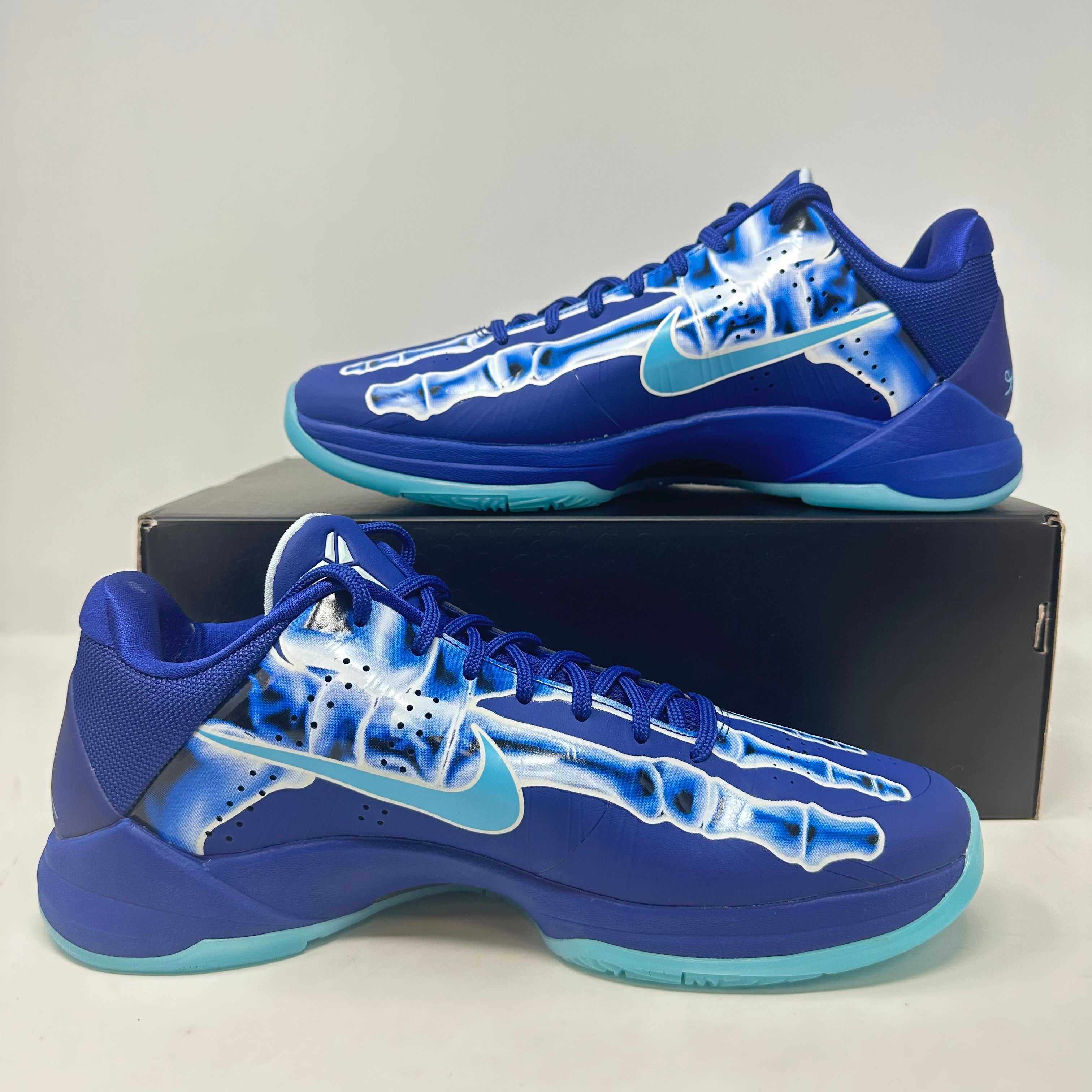 Nike Kobe 5 Protro X-Ray sneakers, brand new with accessories, featuring a blue and white design.
