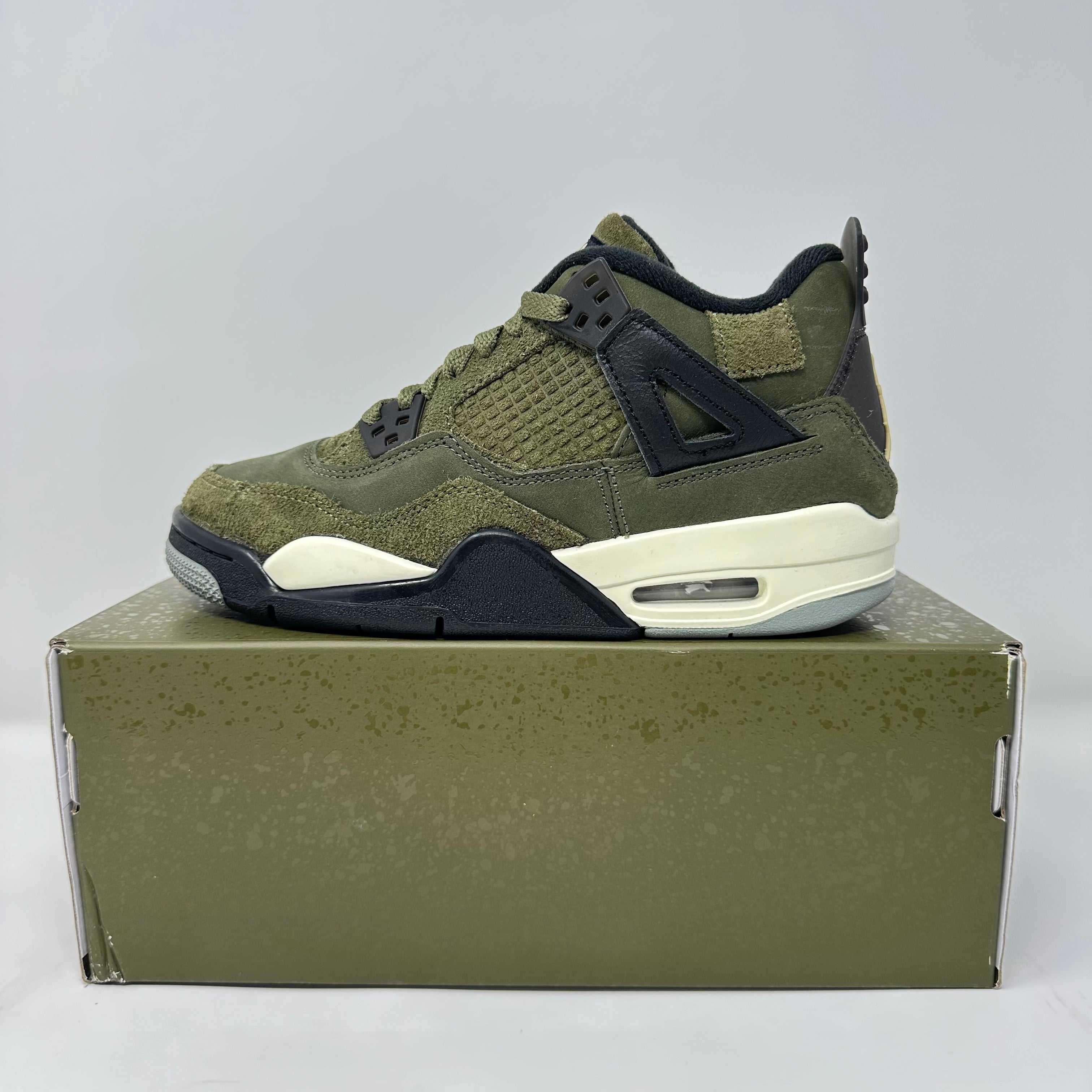 Jordan 4 Retro SE Craft Medium Olive sneaker in brand new condition on matching olive shoe box
