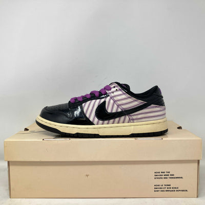 Nike SB Dunk Low Avenger Purple Patent sneaker on box showing pre-owned condition and purple accents