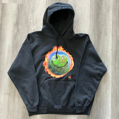 Black Cactus Jack by Travis Scott x PlayStation World hoodie with flaming smiley earth graphic and front pocket
