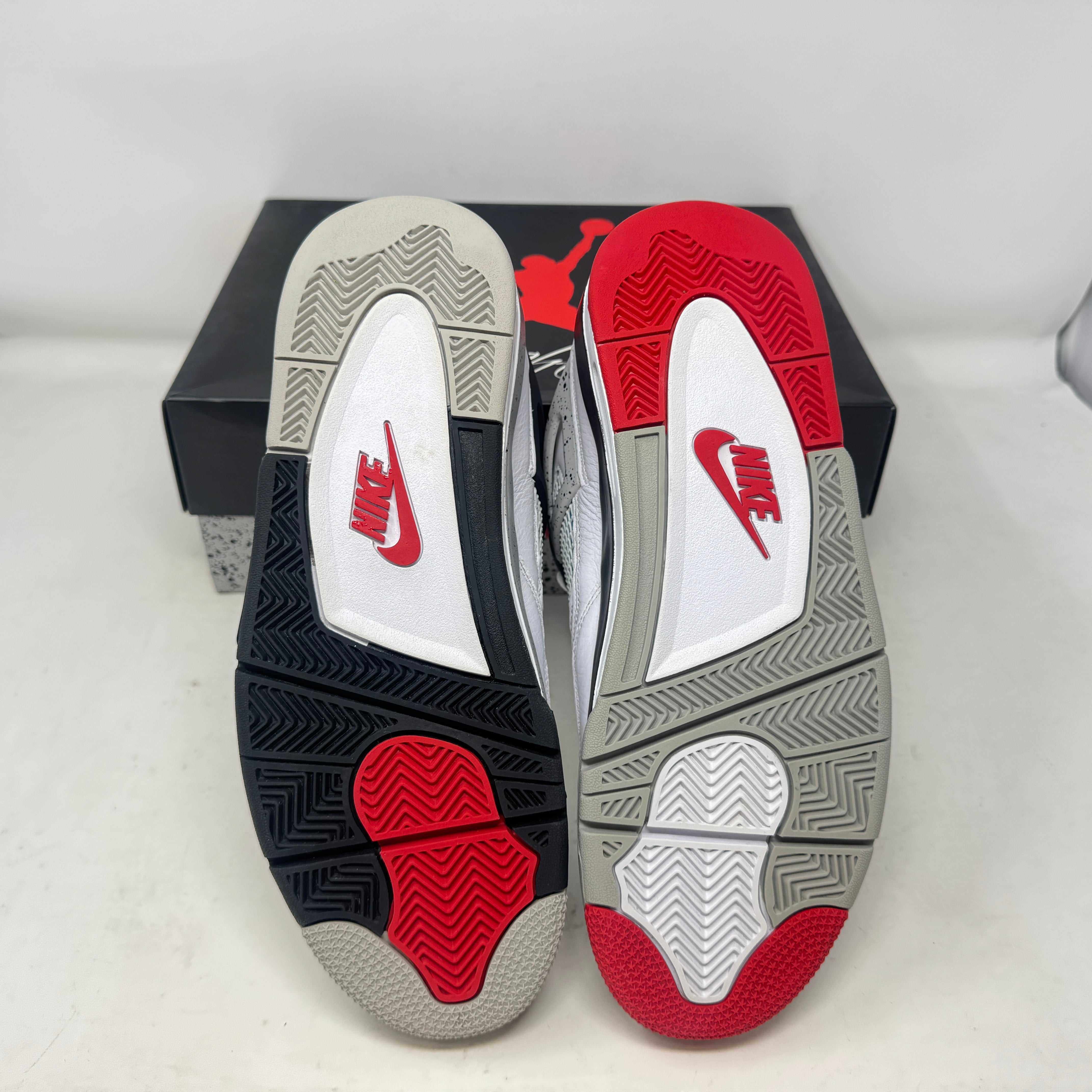 Jordan 4 Retro What The sneakers, pre-owned, complete with box and accessories.