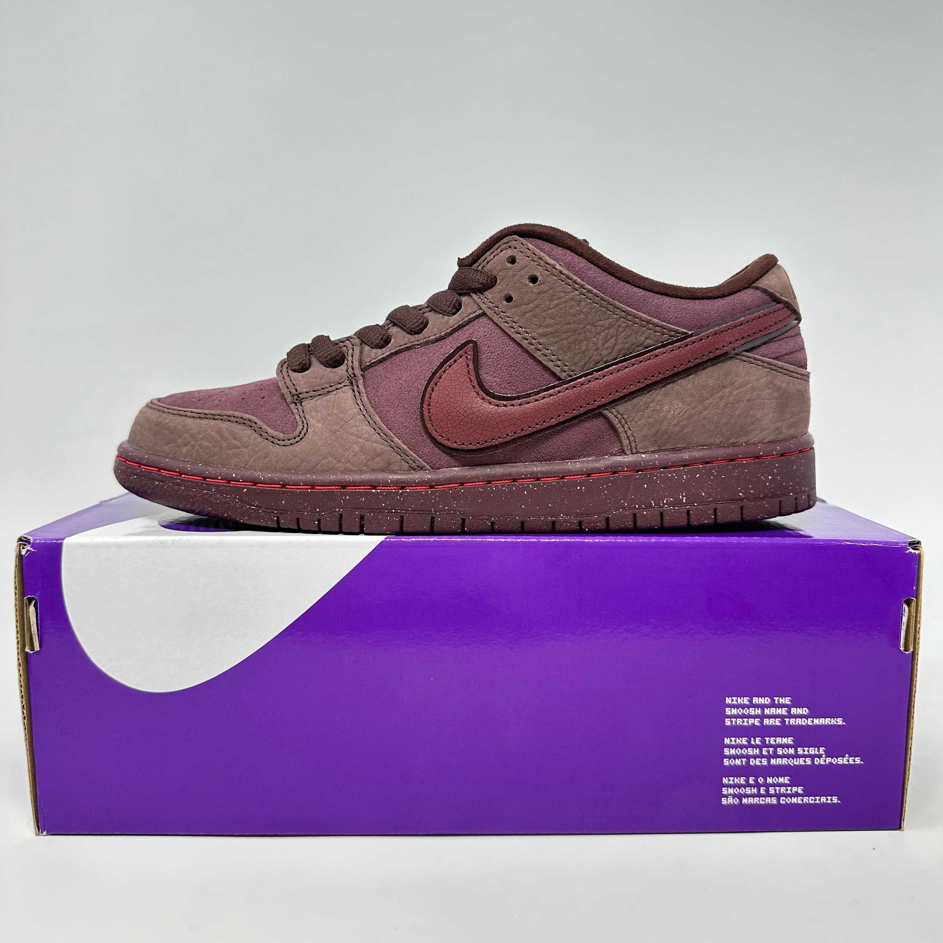 Nike SB Dunk Low City Of Love Burgundy Crush sneaker in burgundy and brown on purple Nike box