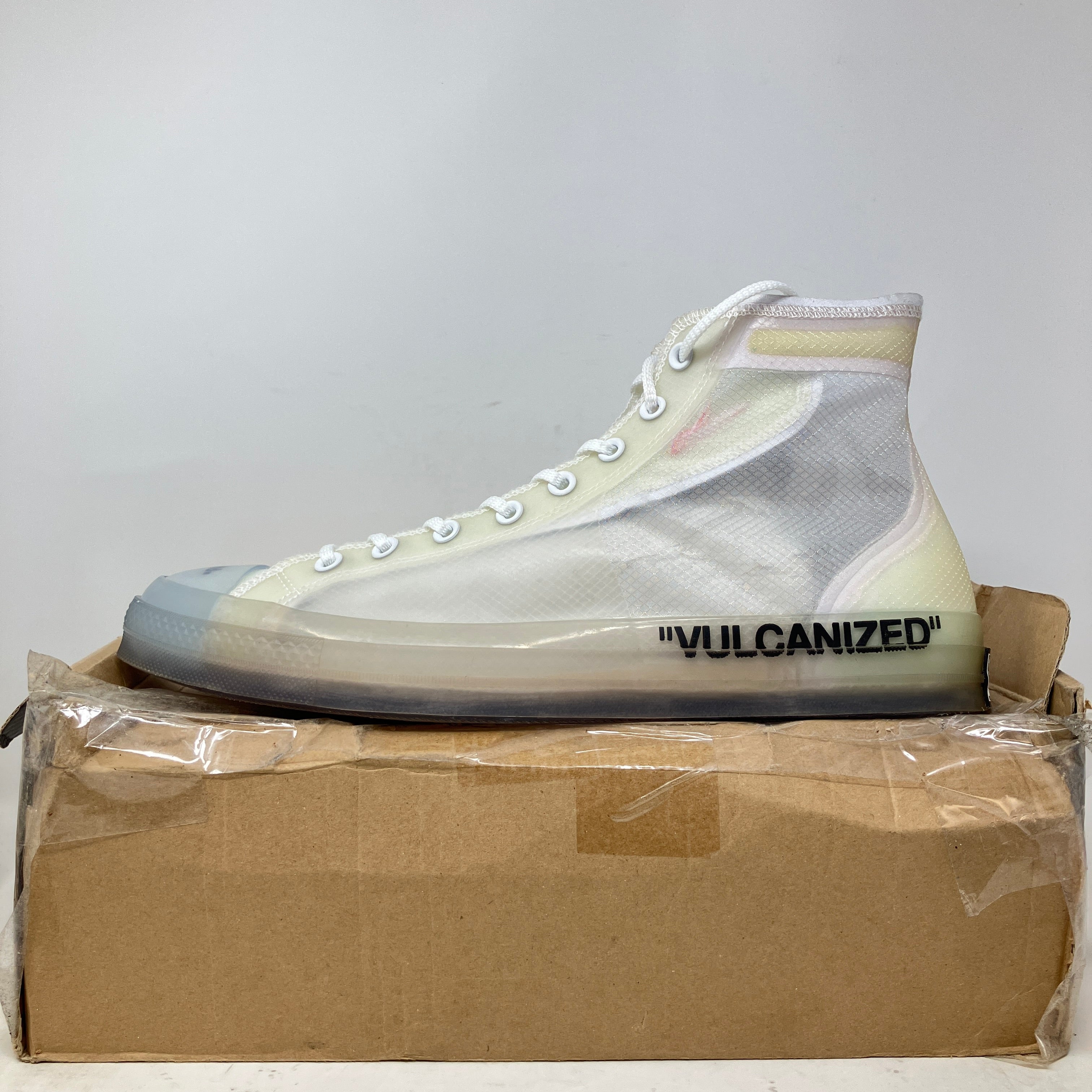 Converse Chuck Taylor All Star Vulcanized Hi Off-White sneaker on damaged box, brand new condition