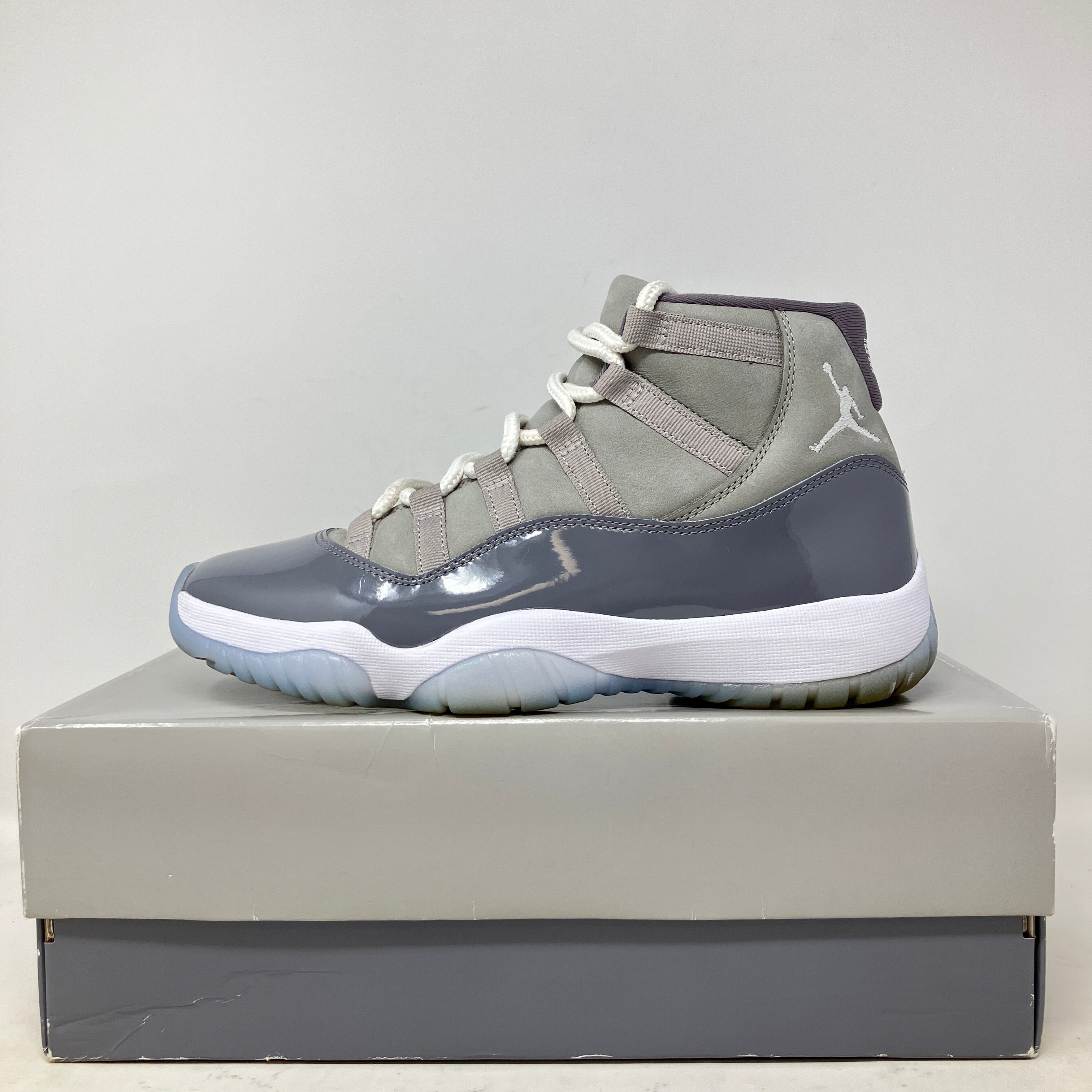 Jordan 11 Retro Cool Grey 2021 sneaker in pre-owned condition with all accessories on box