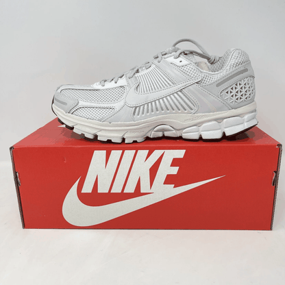 Nike Zoom Vomero 5 white and vast grey running shoe on red Nike box, brand new with all accessories included