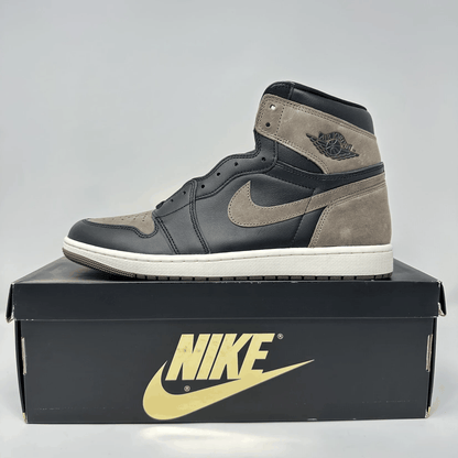 Jordan 1 Retro High OG Palomino sneaker in black and tan on Nike box, brand new with all accessories.