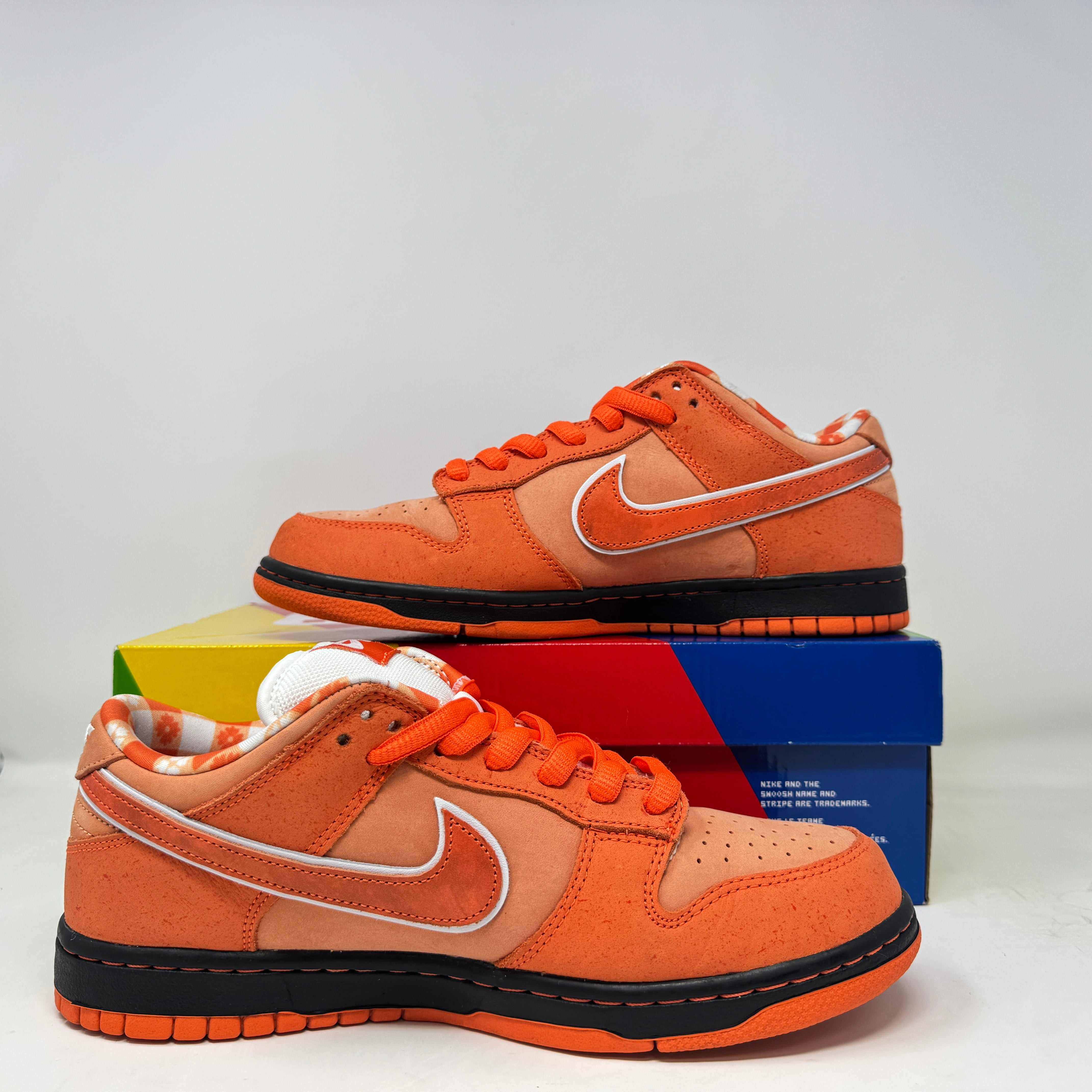 Nike SB Dunk Low Concepts Orange Lobster sneakers, pre-owned, missing rubber bands.