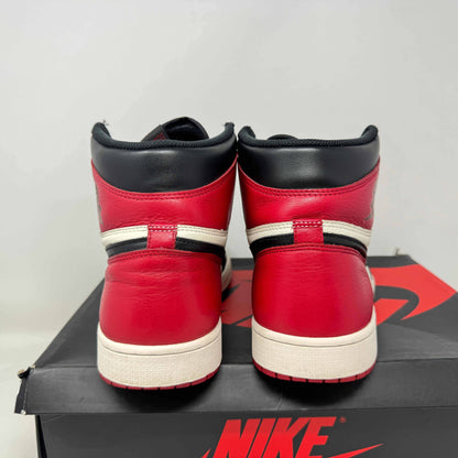 Jordan 1 Retro High Bred Toe preowned sneakers with original accessories.