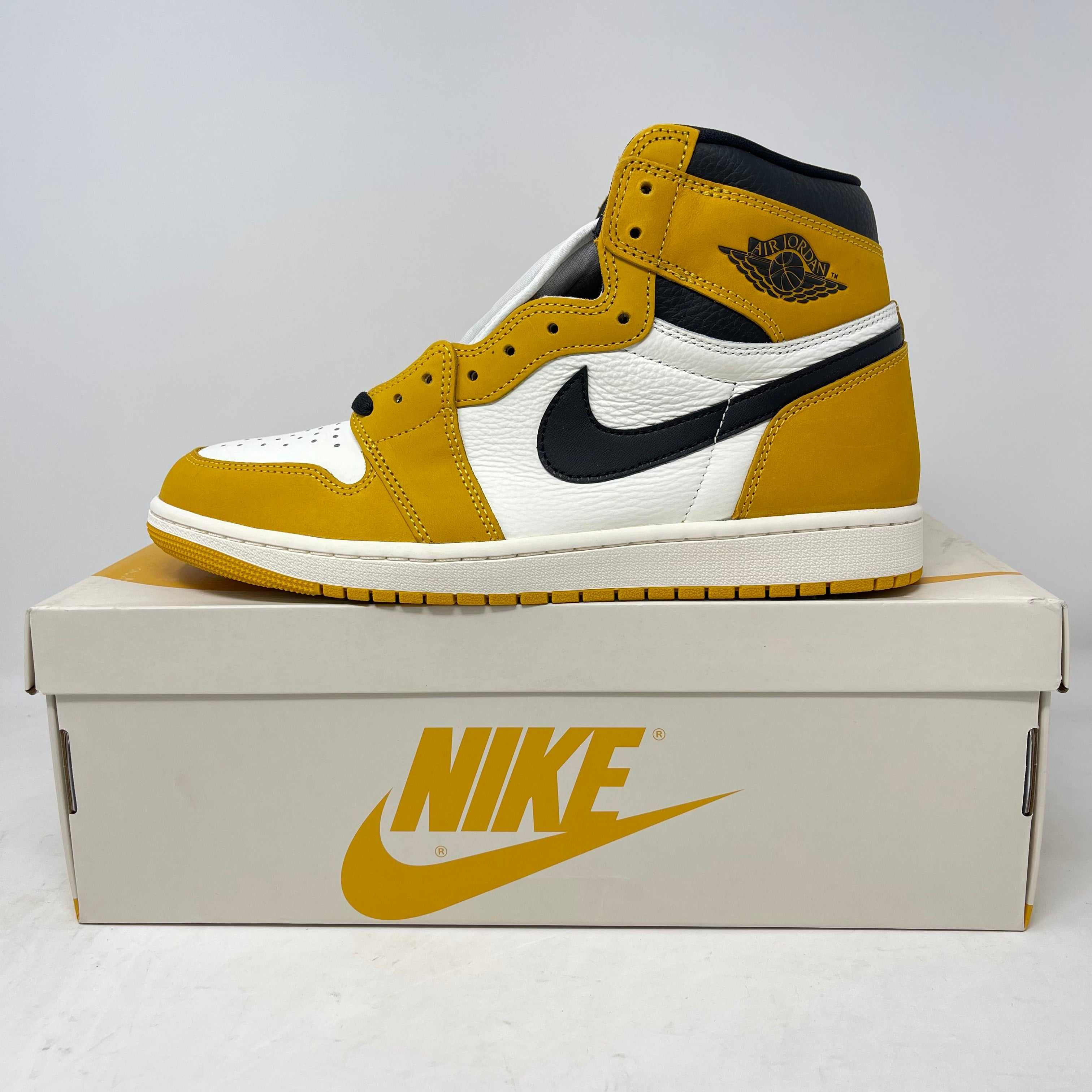 Jordan 1 Retro High OG Yellow Ochre sneaker in brand new condition on Nike shoebox