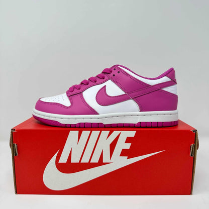 Nike Dunk Low Active Fuchsia GS sneaker in brand new condition displayed on a red Nike box